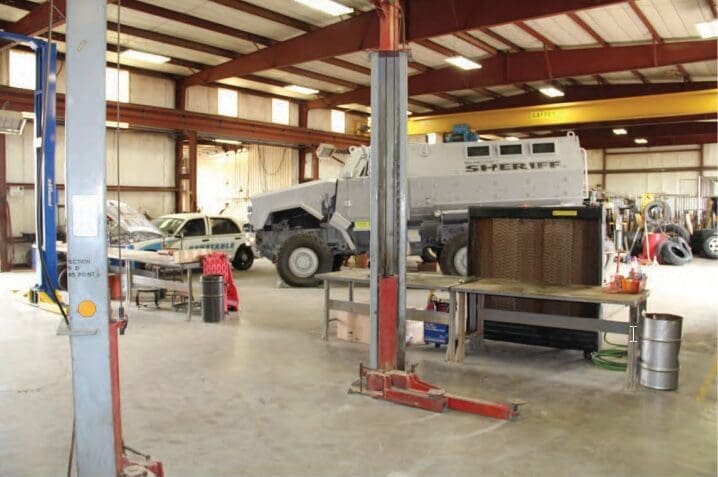 Vector image of a sherif's vehicle in a shop