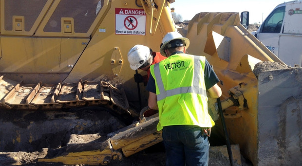 Vector technicians working on a heavy duty vehicle
