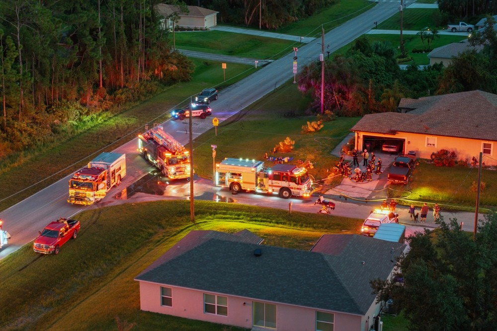 Vector Technicians Work to Support Emergency Fire Truck Vehicles In Action.
